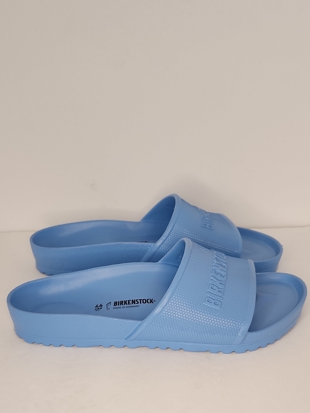 Birkenstock Light Blue Slide Sandals with Embossed Strap